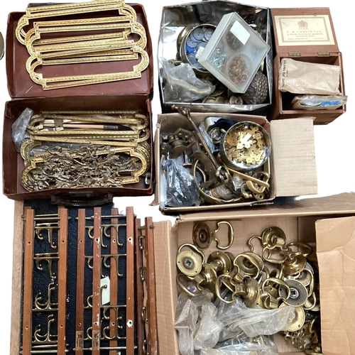 308 - A collection of brass fixtures and fittings, door knobs, coats hooks, hanging brackets, gilt metal f... 