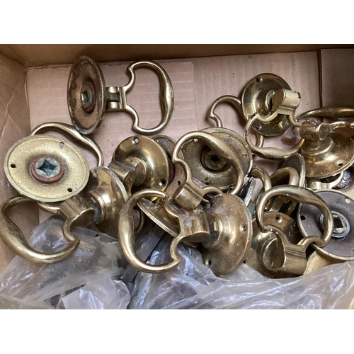 308 - A collection of brass fixtures and fittings, door knobs, coats hooks, hanging brackets, gilt metal f... 