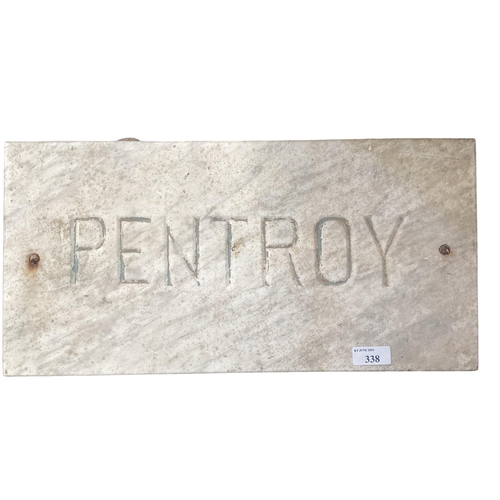 338 - A rectangular composite stone plaque carved PENTROY 27cm x 48cm.