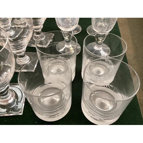 346 - A large collection of glassware to include a set of 4 Biot irradescent wine glasses, etc