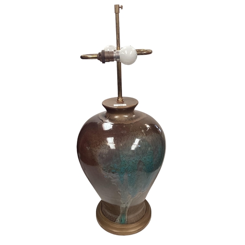 349 - A large ceramic Raku style  lustre lamp of bulbous form, 66cm High with fitting