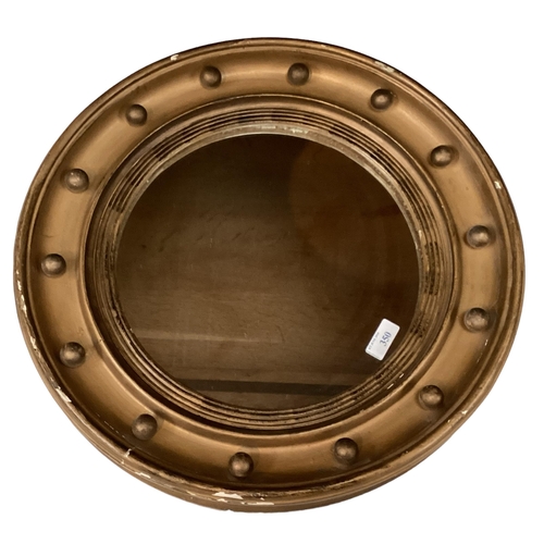 350 - A circular gilt framed wall mirror, 46cm diam