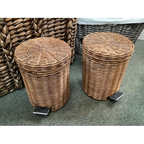 355 - A large modern OKA style basket, an oval basket, and two basket covered pedestal bins