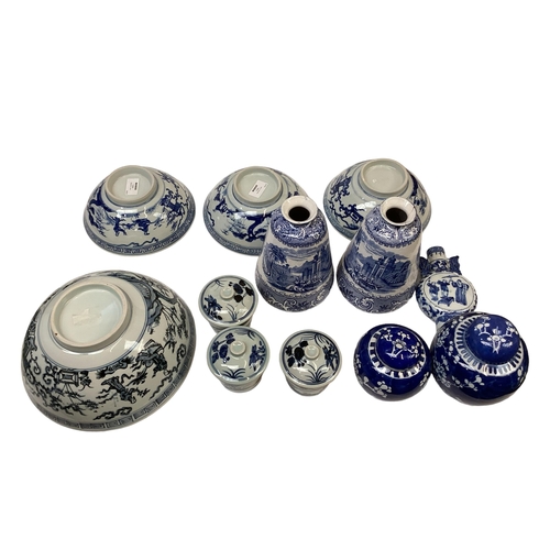 356 - A collection of modern Oriental style blue and white ceramic items to include bowls, ginger jars a s... 