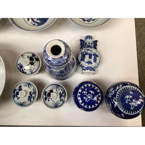 356 - A collection of modern Oriental style blue and white ceramic items to include bowls, ginger jars a s... 