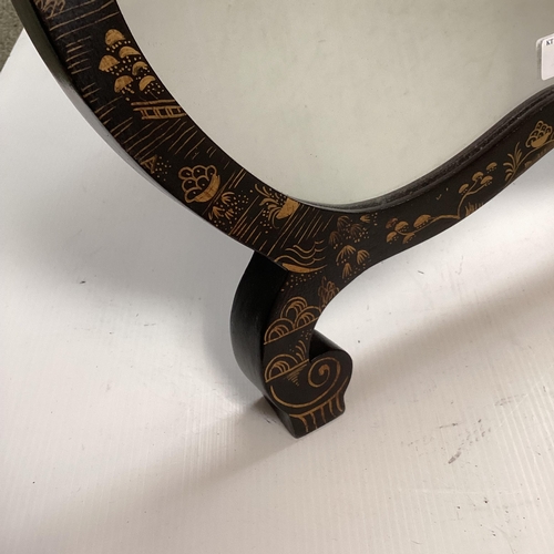 370 - A Chinoiserie black and gilt shield shaped easel backed dressing table mirror, 56cm x 45cm