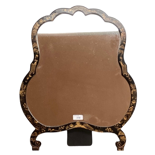 370 - A Chinoiserie black and gilt shield shaped easel backed dressing table mirror, 56cm x 45cm