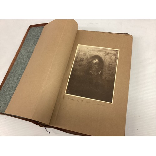 1078 - A leather bound photo album, containing black and white prints, documenting places in India circa 19... 