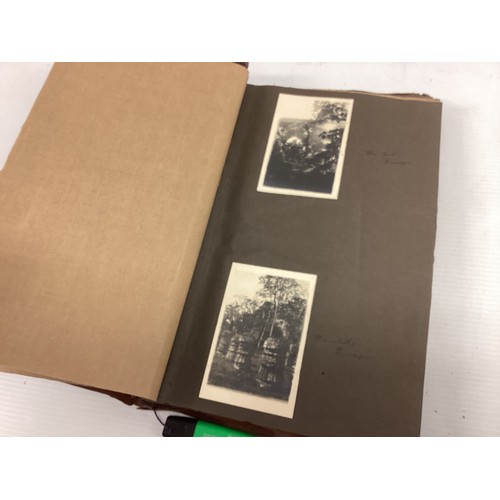 1078 - A leather bound photo album, containing black and white prints, documenting places in India circa 19... 