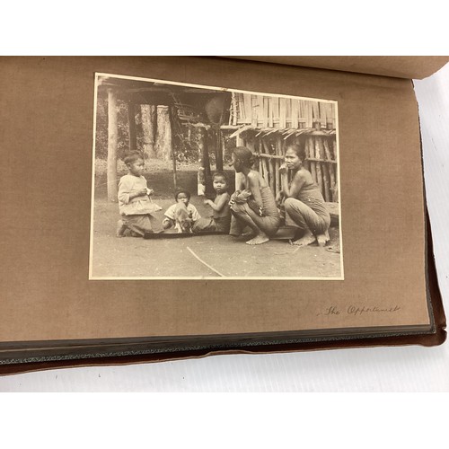 1078 - A leather bound photo album, containing black and white prints, documenting places in India circa 19... 