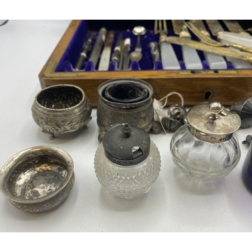 122 - A collection of white metal items. Sandwich tin , South Asian salt etc