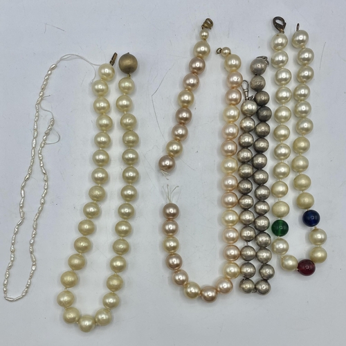 182 - A collection of synthetic pearl costume jewellery.