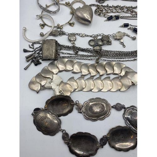 184 - A collection of sterling silver and white metal jewellery.