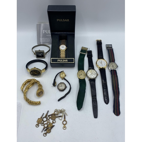 188 - A collection of vintage/high street fashion watches together with a collection of pocket watch keys.