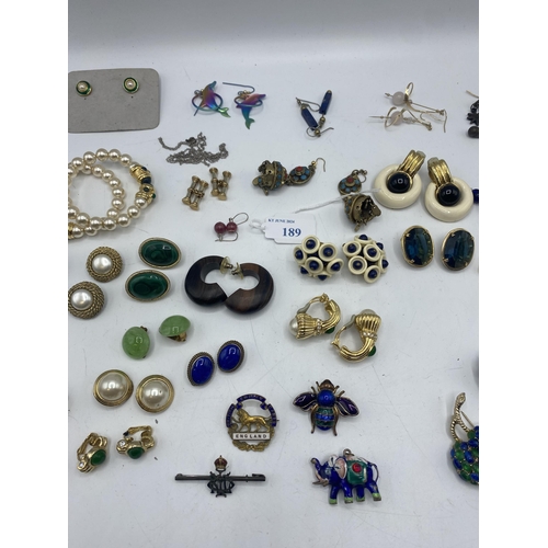 189 - A collection of costume and couture style jewellery.