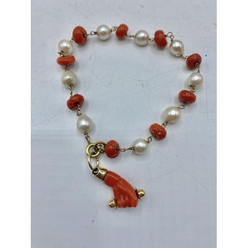 191 - A multi strand  freshwater pearl necklace with citrine set flower clasp together with coral, yellow ... 