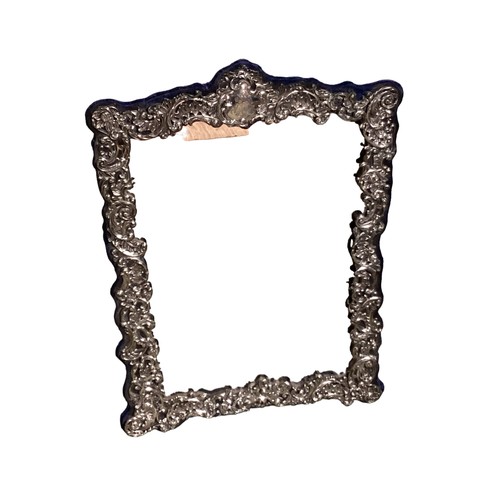 60 - A large sterling silver mounted easel back dressing table mirror. 66cm x 46cm by Henry Mathews, Birm... 
