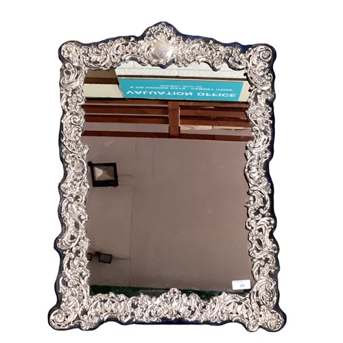 60 - A large sterling silver mounted easel back dressing table mirror. 66cm x 46cm by Henry Mathews, Birm... 