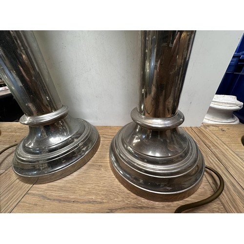 228 - A pair of large contemporary white metal table lamps of column form. Each 61cm(h)