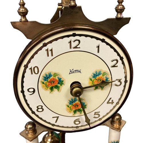 264 - Two 20th century brass skeleton clocks in glass domes with stands. 25cm(h) 15cm(h)