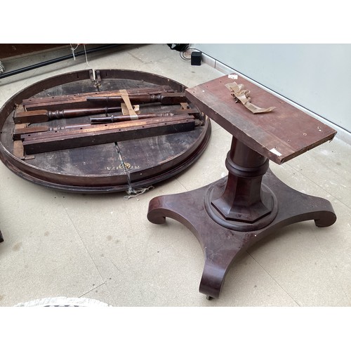 540 - A mahogany circular pedestal table, with extension leaves with pedestal base, and a mahogany drop le... 