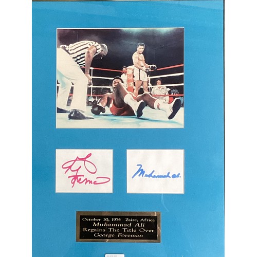 446 - Muhammed Ali and George Foreman signed autographs with Boxing Photo 'Rumble in the Jungle' In glazed... 