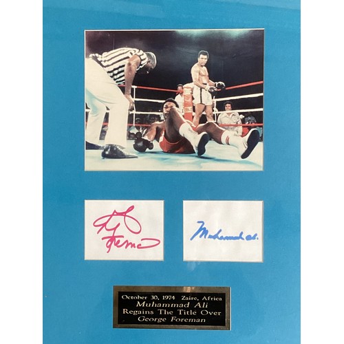 446 - Muhammed Ali and George Foreman signed autographs with Boxing Photo 'Rumble in the Jungle' In glazed... 