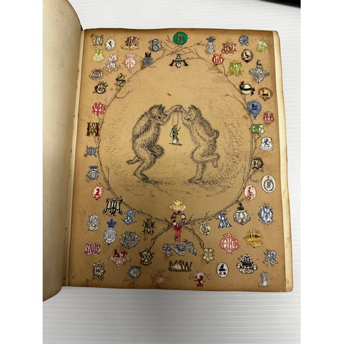 301 - A unique and extensive collection of C19th and C20th albums,  containing family and heraldic crests ... 