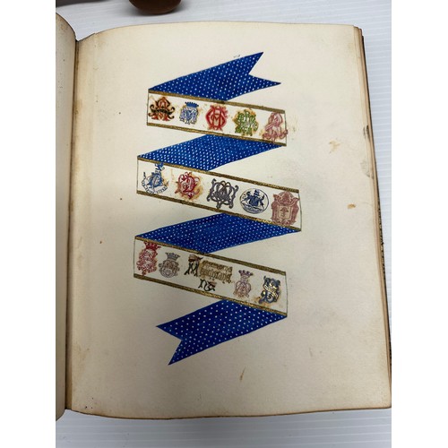 301 - A unique and extensive collection of C19th and C20th albums,  containing family and heraldic crests ... 