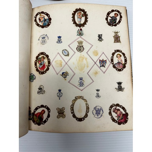 301 - A unique and extensive collection of C19th and C20th albums,  containing family and heraldic crests ... 