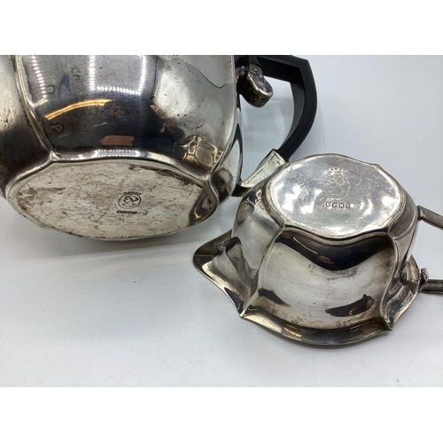 112 - A collection of sterling silver and white metal items to include three piece tea set a boxed pair of... 