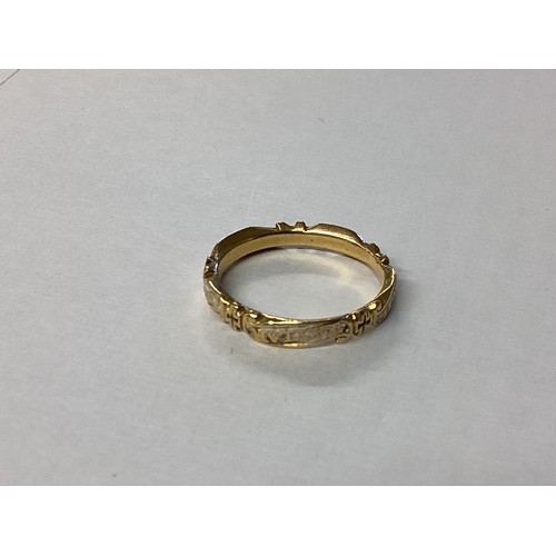 76 - An unmarked yellow metal and white enamel mourning ring stamped to inside of hoop EC, Rich Taylar OB... 