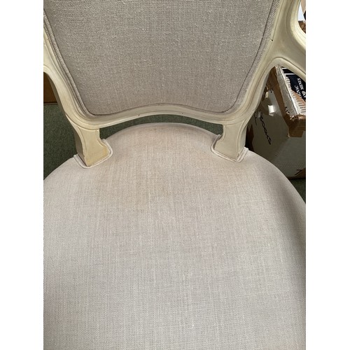 520 - A pair of French style upholstered open arm chairs