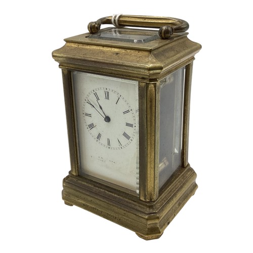 110 - A miniature brass carriage clock in original velvet lined case. With numbered movement 2051. 7cm (h)... 