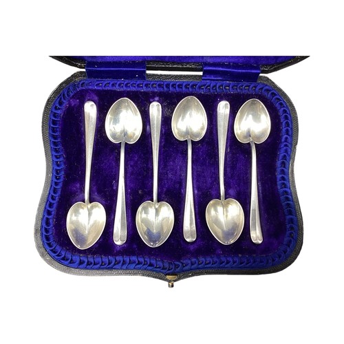 100 - A  boxed set of six Sterling silver Arts and Crafts style tea spoons with heart shaped bowls by Atki... 