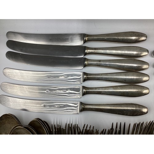 88 - A set of continental 800 silver flatware together with matching silver handled cutlery. Hallmarked w... 