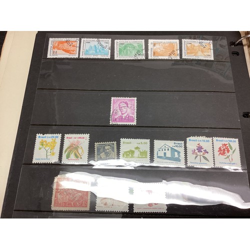 85 - A large collection of UK and World stamps together with a collection of commemorative coins and firs... 