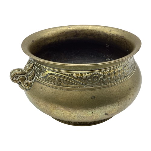 366 - An Oriental bronze Censor. With cast six character mark cartouche to base, 18cm x 9cm.