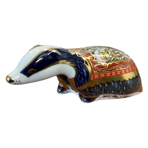 441 - Four Royal Crown Debry models of Badgers of differing designs, to include woodland badger moonlight ... 