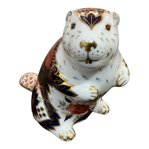 431 - Three Crown Derby Models of Beavers to include a numbered signature edition example.