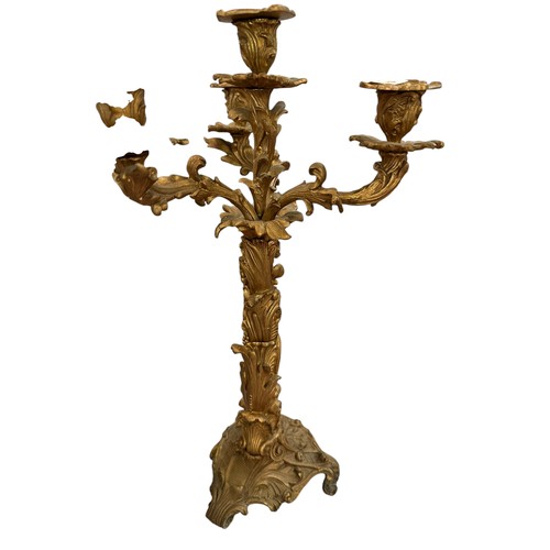 377 - A gilt metal table candelabra 49cm(h)an empty Magnum bottle of Champagne, a polo ball and stick and ... 