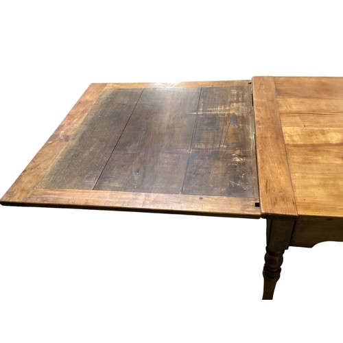 560 - A mid C19th French Cherry wood extending kitchen table, 165cm length, closed. x 85cm Wide. measure w... 