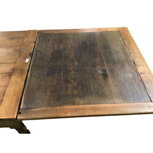 560 - A mid C19th French Cherry wood extending kitchen table, 165cm length, closed. x 85cm Wide. measure w... 