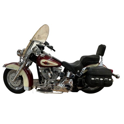 380 - A Franklin Mint model of a Harley-Davidson Heritage Softail classic with COA. Together with a Kyosho... 