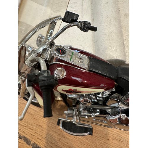 380 - A Franklin Mint model of a Harley-Davidson Heritage Softail classic with COA. Together with a Kyosho... 