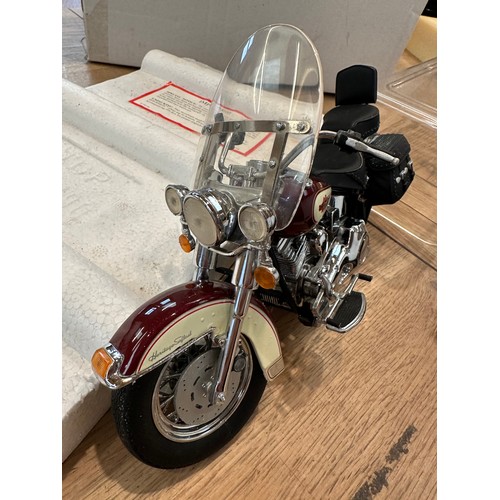 380 - A Franklin Mint model of a Harley-Davidson Heritage Softail classic with COA. Together with a Kyosho... 