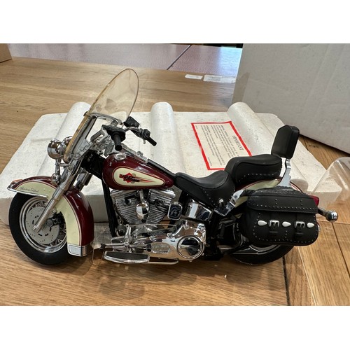 380 - A Franklin Mint model of a Harley-Davidson Heritage Softail classic with COA. Together with a Kyosho... 