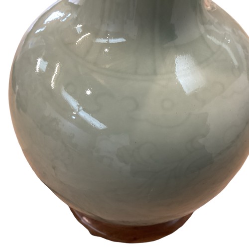 383 - A Celadon style vase on turned wooden stand. 33cm(h)