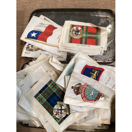 391 - Two albums of stamps containing UK, China and World stamps, together with  a collection of postcards... 