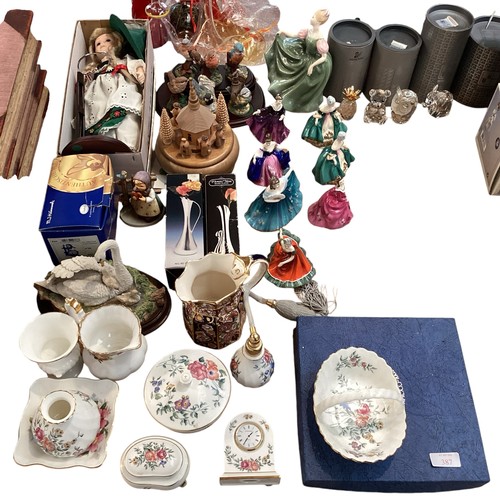 387 - Three boxed LLadro figures together with a collection of boxed Doulton, Wedgwood and Swarovski items... 